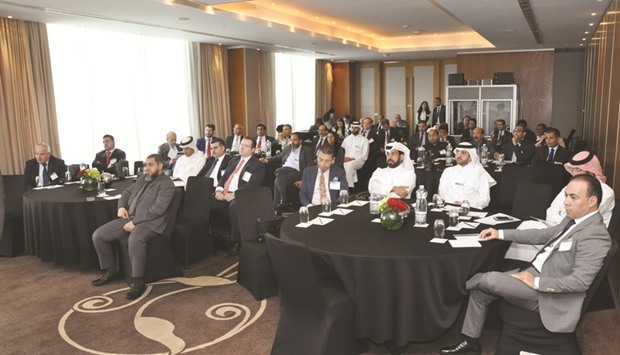 Al-Mansoori, along with attendees, at the u201cGoing Public: Readiness and  Successu201d seminar.