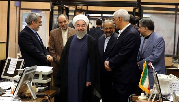Iran's President Hassan Rouhani visits an election office in Tehran.