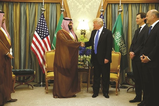 US President Donald Trump meets with Saudi Arabiau2019s Deputy Crown Prince and Minister of Defence Mohammed bin Salman (centre left) at the Ritz-Carlton Hotel in Riyadh. US and Saudi Arabian companies signed business deals worth tens of billions of dollars yesterday.
