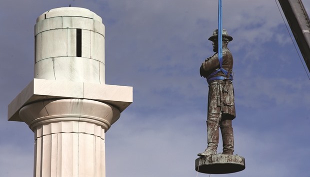 A monument of Robert E Lee, who was a general in the Confederate Army, is removed in New Orleans.