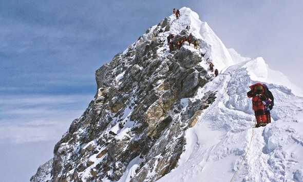 This file photo shows climbers descending the Hillary Step on Mt Everest.