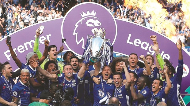 Chelsea players celebrate their Premier League title triumph after their win over Sunderland at Stamford Bridge in London yesterday. (AFP)