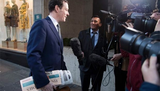 George Osborne arrives on his first day at work as editor of the Evening Standard newspaper in London on Tuesday.