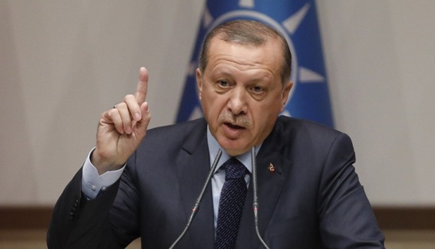 Turkish President Tayyip Erdogan makes a speech at the ruling AK Party's headquarters in Ankara.