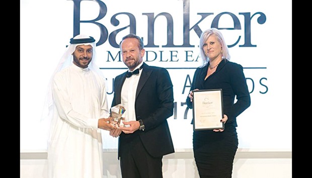IBQ receiving u201cBanker Middle East Industry Awards 2017u201d during a ceremony in Dubai.