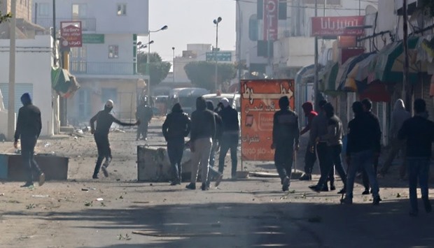 Tunisian police clash with protestors
