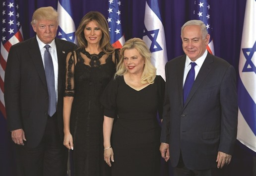 US President Donald Trump, First Lady Melania Trump, Sara Netanyahu and Israelu2019s Prime Minister Benjamin Netanyahu pose for pictures before an official dinner in Jerusalem yesterday.
