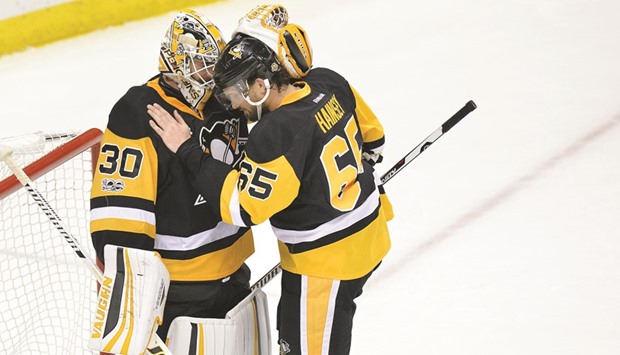 Pittsburgh Penguins defenseman Ron Hainsey (R) celebrates with goalie Matt Murray after beating the Ottawa Senators in game five of the Eastern Conference Final of the 2017 Stanley Cup Playoffs at PPG PAINTS Arena. PICTURE: USA TODAY Sports
