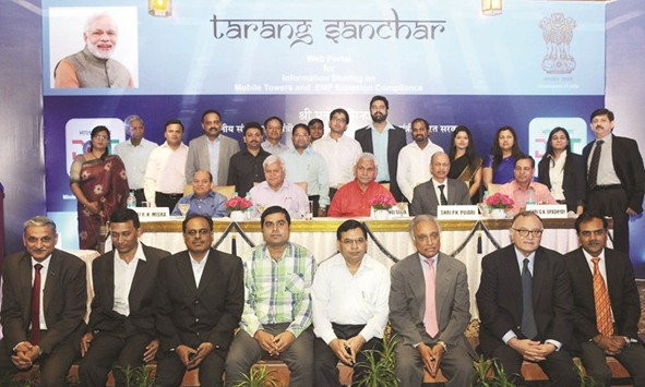 Minister of State for Communications Manoj Sinha is seen with officials during the launch of Tarang Sanchar web portal, in New Delhi yesterday.