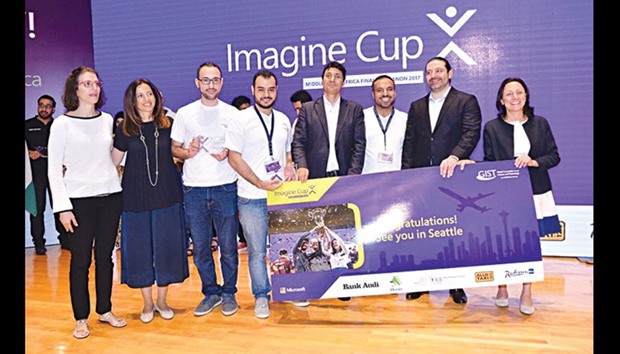 The winning team from QU-CENG receives their prize from the Prime Minister of Lebanon Saad al-Hariri.