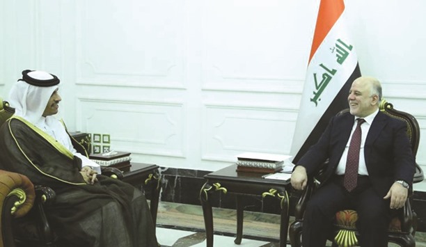 HE the Foreign Minister Sheikh Mohamed bin Abdulrahman al-Thani during a meeting with Iraqi Prime Minister Haider al-Abadi in Baghdad yesterday.