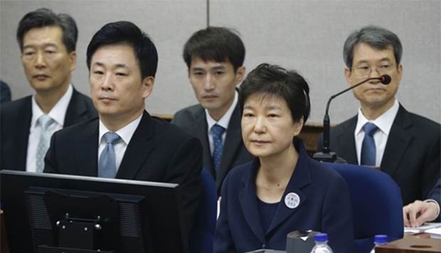 Former South Korean President Park Geun-hye attends her trial at the Seoul Central District Court on Tuesday.