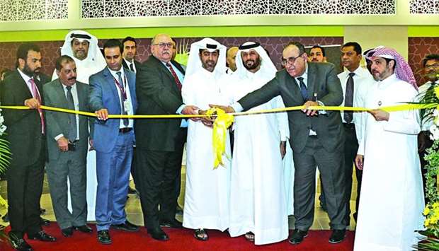 Al Meera officials during ribbon-cutting ceremony of the Leaibab 2 branch opening