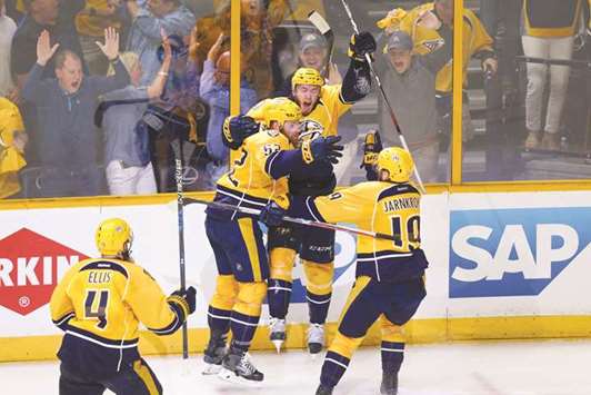 Nashville Predators centre Colton Sissons (centre) celebrates with teammates after scoring his hat-trick against the Anaheim Ducks in the third period in game six of the Western Conference final of the 2017 Stanley Cup Playoffs. PICTURE: USA TODAY Sports