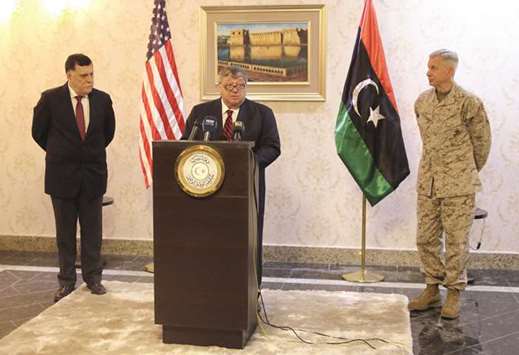 The US ambassador to Libya Peter Bodde speaks during a news conference with Marine General Thomas Waldhauser (right), the top US military commander overseeing troops in Africa, and Prime Minister of Libyau2019s Government of National Accord (GNA) Fayez Seraj, in Tripoli, yesterday.