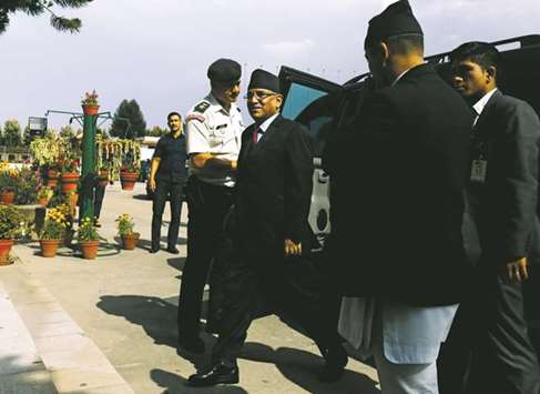 Nepalese Prime Minister Pushpa Kamal Dahal arrives at the parliament in Kathmandu.