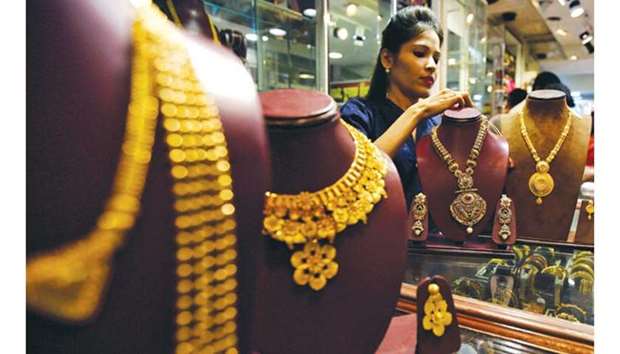 A salesperson at a jewellery showroom in Mumbai. Indiau2019s gold imports could hit 450 tonnes in the first half of the year, more than double from the same period in 2016, according to a senior analyst at GFMS, a division of Thomson Reuters.