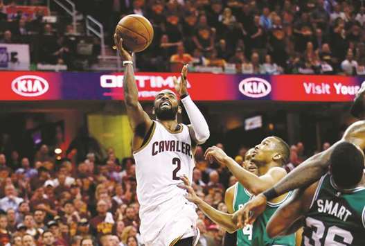 Kyrie Irving (left) of the Cleveland Cavaliers shoots against the Boston Celtics in the second half of Game Four of the 2017 NBA Eastern Conference Finals in Cleveland, Ohio, on Tuesday. (AFP)
