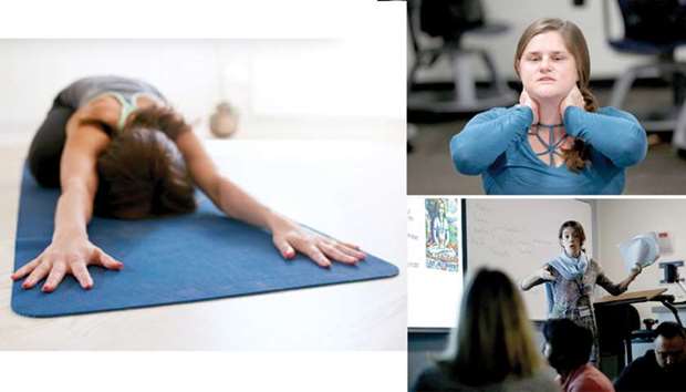 (TOP RIGHT) DEMO: Julia Kasza, 25, a first year masteru2019s degree student in yoga, gives a demonstration during a class taught by Professor Ana Funes at Loyola Marymount University, in Los Angeles, California.  (BELOW RIGHT) CLASS: Professor Ana Funes conducts a masteru2019s degree yoga class at Loyola Marymount University.