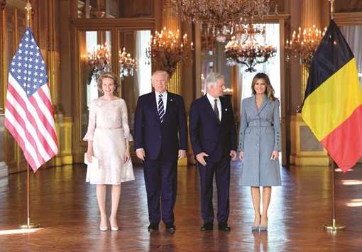 Queen Mathilde of Belgium, US President Donald Trump, King Philippe - Filip of Belgium and US First Lady Melania Trump stand during a reception at the Royal Palace in Brussels.