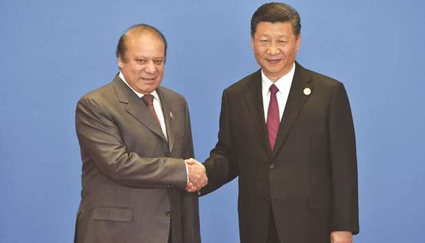 GRAND PARTNERSHIP: Prime Minister Nawaz Sharif, left, with Chinese President Xi Jinping at the OBOR summit in Beijing.