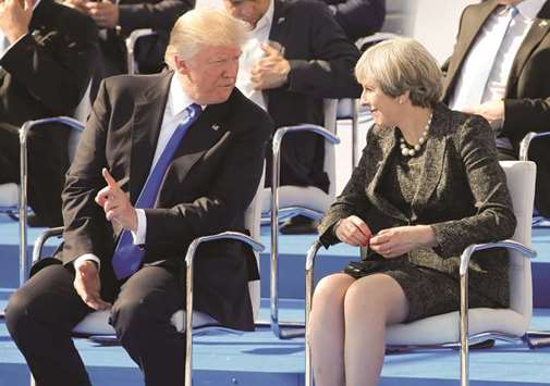 US President Donald Trump with Britainu2019s Prime Minister Theresa May at the start of the Nato summit at their new headquarters in Brussels.