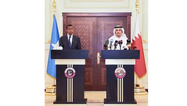 Qataru2019s Foreign Minister, HE Sheikh Mohamed bin Abdulrahman al-Thani, and his Somali counterpart, Yussef Jarad Omar Ahmed, address a joint press conference in Doha yesterday.