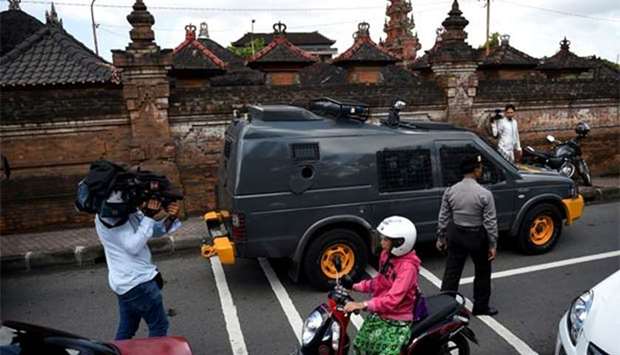 Indonesian police prepare two armoured vehicles during a security preparation for Schapelle Corby to return back to Australia, in Denpasar on Saturday.