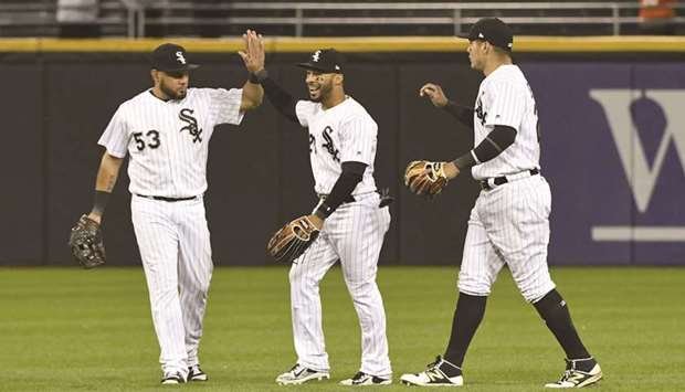 Chicago White Sox players Melky Cabrera (right), Leury Garcia (left) and Avisail Garcia celebrate after beating the Detroit Tigers in their MLB match. PICTURE: USA TODAY Sports