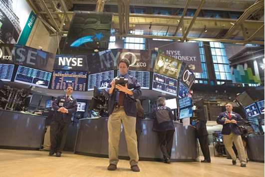 Traders work on the floor of the New York Stock Exchange. The S&P 500 Index has climbed 7.9% since January, including its biggest gain since April in the just-completed week.