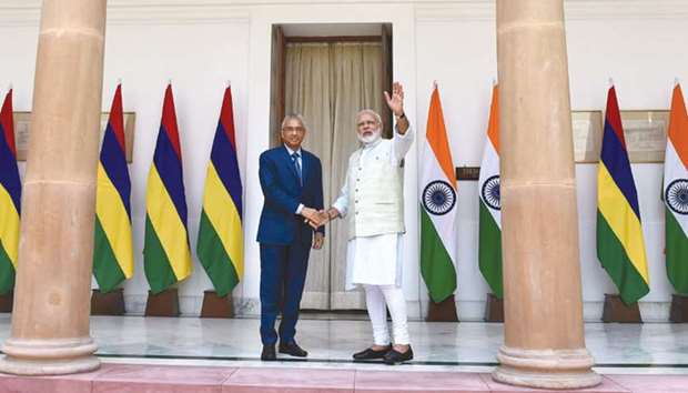 Prime Minister Narendra Modi shakes hands with his Mauritian counterpart Pravind Kumar Jugnauth prior to a meeting in New Delhi yesterday.