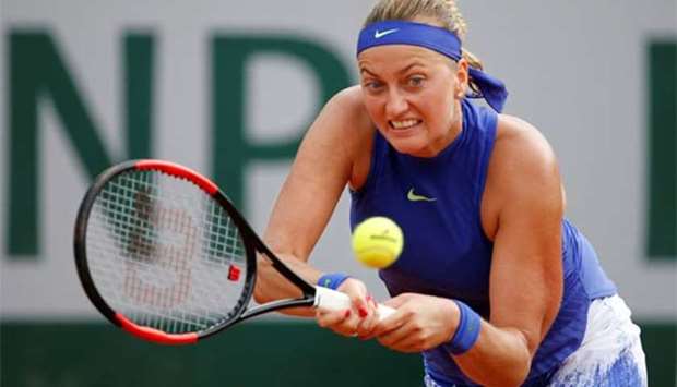 Petra Kvitova in action during her first round match against USA's Julia Boserup.
