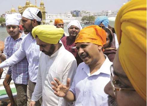 Delhi Chief Minister Arvind Kejriwal pays obeisance at the Golden Temple in Amritsar yesterday.