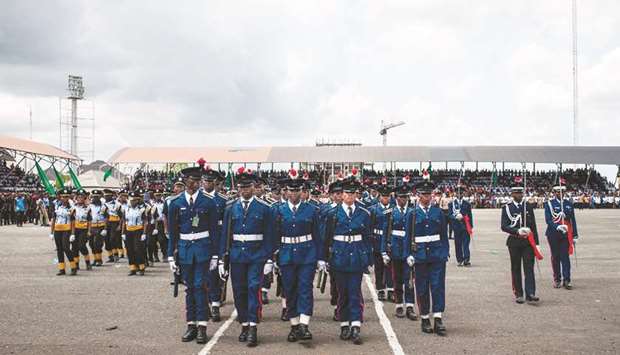 Nigerian soldiers take part in the Democracy Day parade in Owerri yesterday.