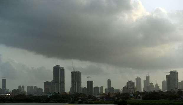 Dark clouds gather over the skyline in Mumbai as India's monsoon season approaches