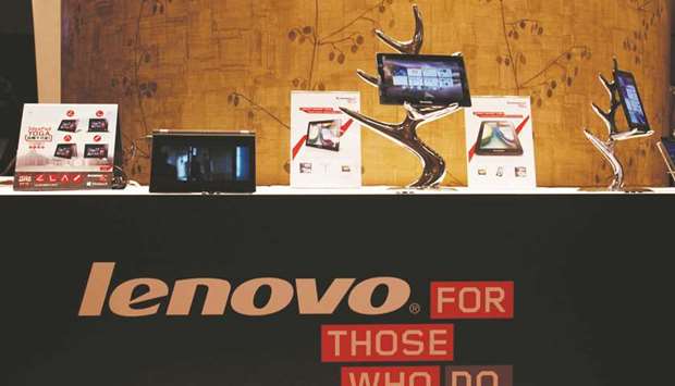 Lenovo tablets and mobile phones are displayed during a news conference in Hong Kong. The groupu2019s phone problems started after it acquired Motorola Mobility from Google for $2.9bn in 2014 but struggled to integrate the assets.