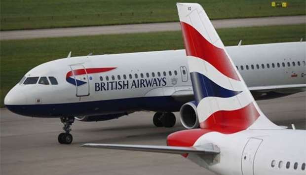 British Airways planes are parked at Heathrow Terminal 5 in London.