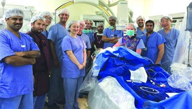 Prof Hijazi (fourth left) with HMC team after a successful implantation.