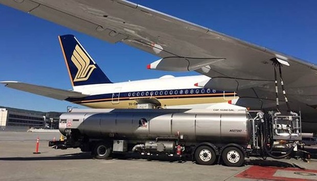 A Singapore Airlines plane is being refuelled with biofuel at San Francisco airport.