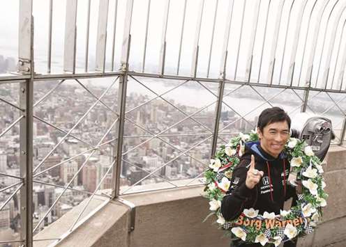Indy500 winner Takuma Sato poses during a visit to the Empire State Building in New York City on Tuesday. (Reuters)