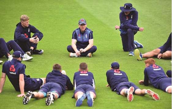 Englandu2019s captain Eoin Morgan (centre) talks to the team ahead of their practice session at The Oval in London yesterday. (AFP)