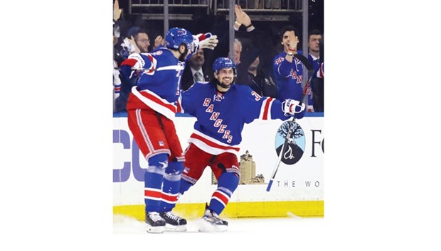Mats Zuccarello (R) of the New York Rangers celebrates his first period goal against the Ottawa Senators in Game Three of the Eastern Conference Second Round during the 2017 NHL Stanley Cup playoffs in New York City. (Getty Images/AFP)