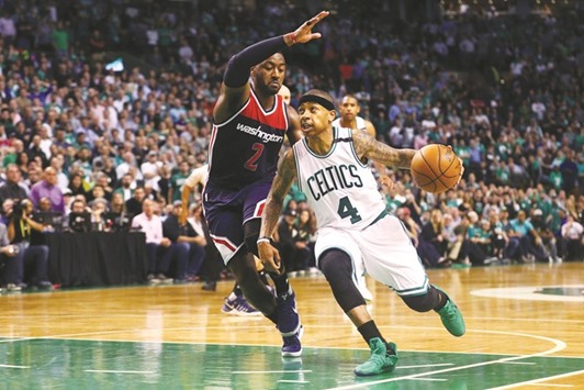 Isaiah Thomas of the Boston Celtics drives against John Wall of the Washington Wizards during the fourth quarter of Game Two of the Eastern Conference semi-finals at TD Garden in Boston. (Getty Images/AFP)