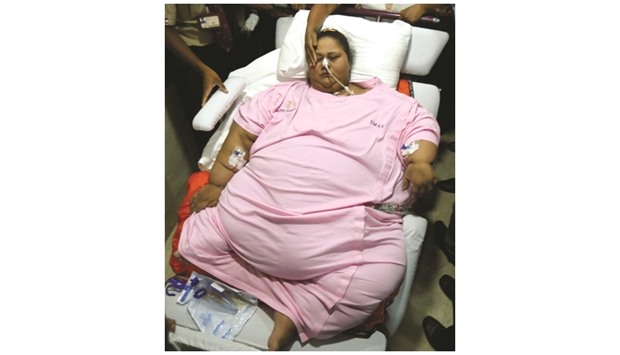 Eman Ahmed is carried on a stretcher as she leaves a hospital in Mumbai, yesterday.