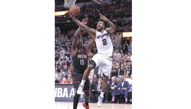 Spurs rebound to beat Rockets 121-96, but lose Parker