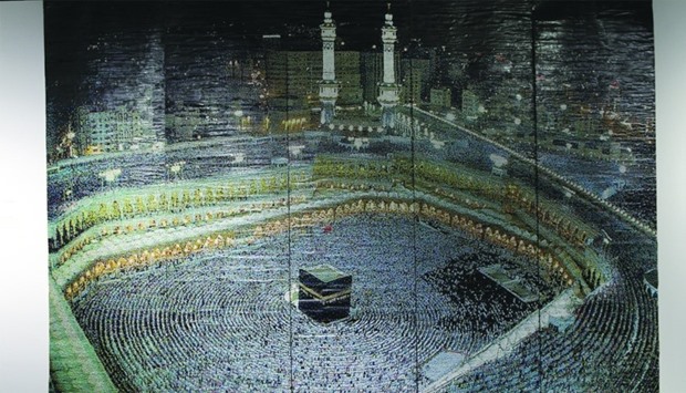 u2018Holy Masjid of Makkah', an artwork created with more than 600,000 circular paper bits made using a paper-punch. 