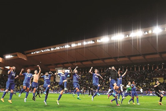 Juventusu2019 forward from Argentina Gonzalo Higuain (black jacket) celebrates with teammates after their 2-0 win over Monaco during the UEFA Champions League semi-final first leg match at the Stade Louis II stadium in Monaco. (AFP)
