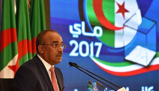 Algerian Interior and Territorial Collectivities Minister Noureddine Bedoui announces the results of the country's legislative elections in Algiers on Friday.