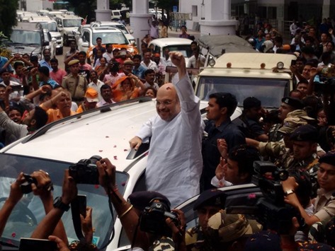 BJP president Amit Shah waves to supporters as he arrives in Agartala yesterday.