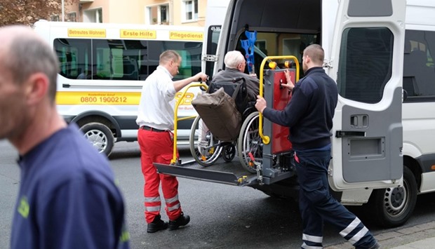 A patient of care facility Alloheim is evacuated in Hannover during the evacuation operation.